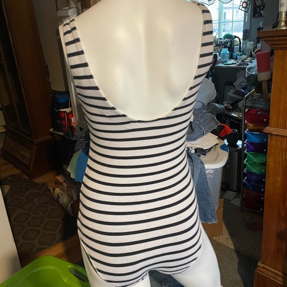 Mink Pink bodysuit with snap crouch navy blue stripped. Size small #145